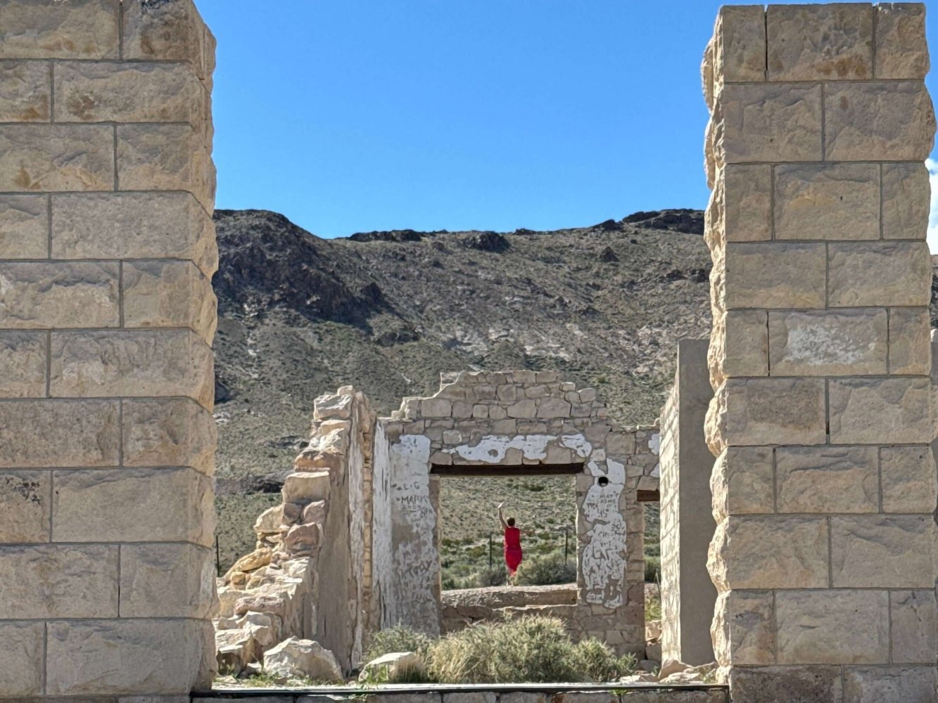 Woman in Red: Rhyolite - Gunderson Schulman Photography