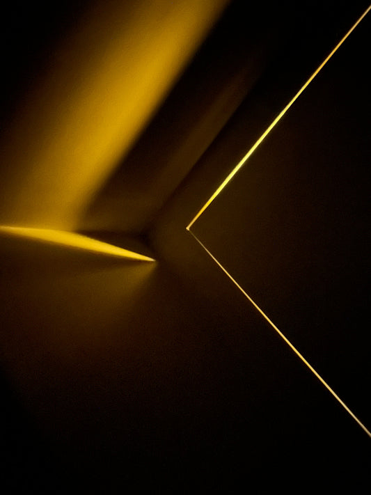 Gold light strip on a dark background